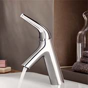 VitrA Nest tap with water flowing out